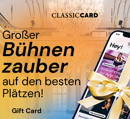 Ein mit Geschenkband verschnürtes Handy. Werbung für den ClassicCard-Geschenkgutschein. "Großer Bühnenzauber auf den besten Plätzen"